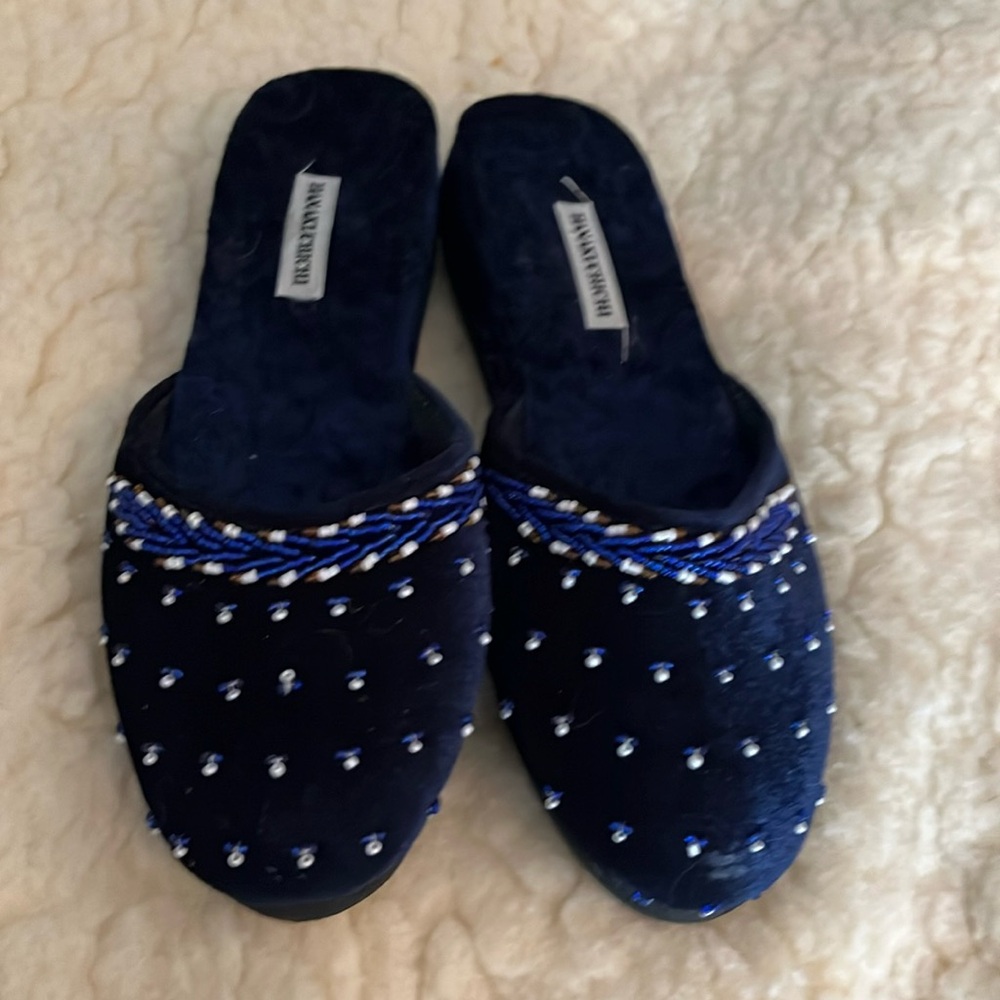 These adorable hand beaded slippers with a valour blue fabric.in VGC